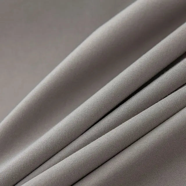 SleekShade Blackout Curtain | Thin & Lightweight with TPU Interlining | Multiple Colors & Sizes | Pleated Tape & Grommet Top Options